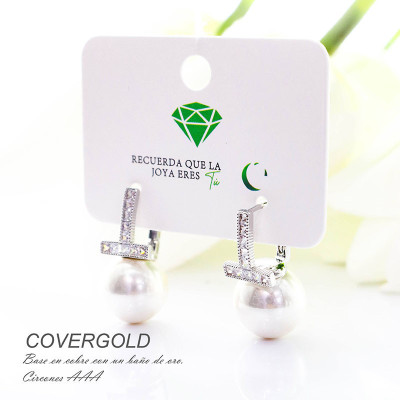 Aretes con circones y perla en covergold