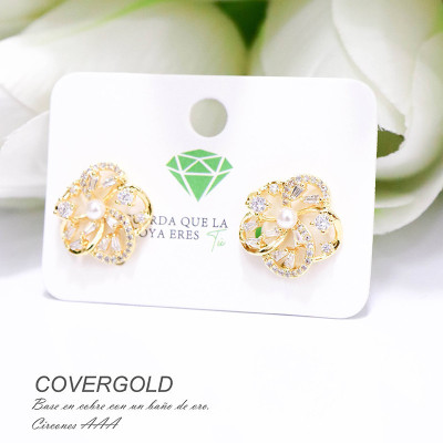 Aretes de flor en covergold