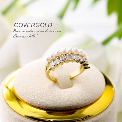 Anillo de circones y perla en covergold