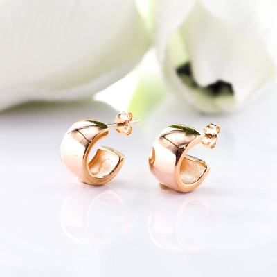 Aretes de corazón en plata ley 925 con baño en Rodio
