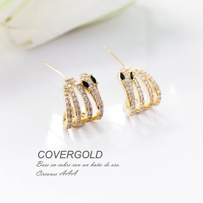 Aretes de serpiente en covergold con baño en Rodio