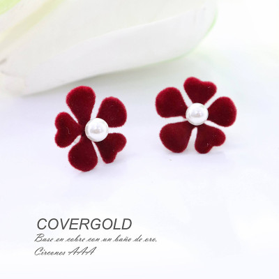Aretes en gamuza con base en covergold