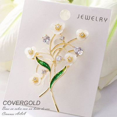 Broches en covergold con baño en Rodio