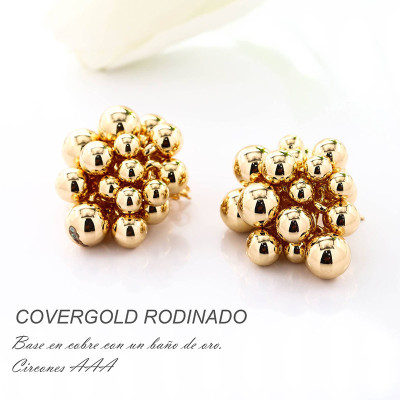 Aretes de bolas en covergold con baño en Rodio