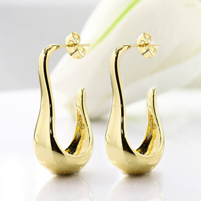 Aretes en covergold con baño en Rodio