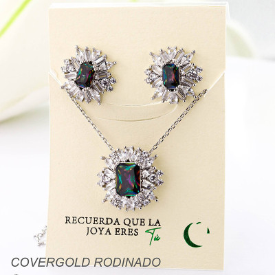 Set collar y aretes en covergold con baño en Rodio