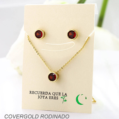 Set collar y aretes en covergold con baño en Rodio