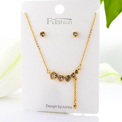 Set de corazones collar y aretes en Rodio