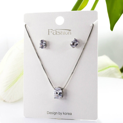 Set collar y aretes en Rodio