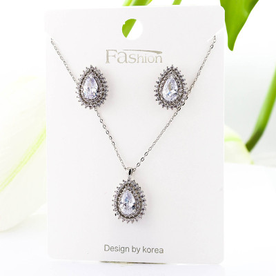 Set collar y aretes en Rodio