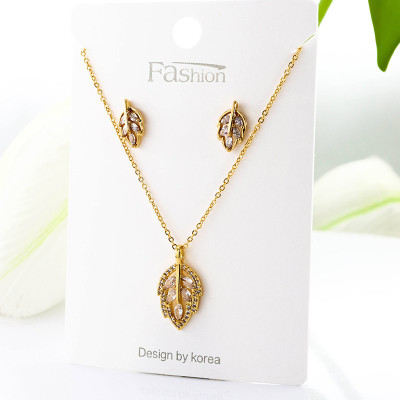 Set de hoja collar y aretes en Rodio