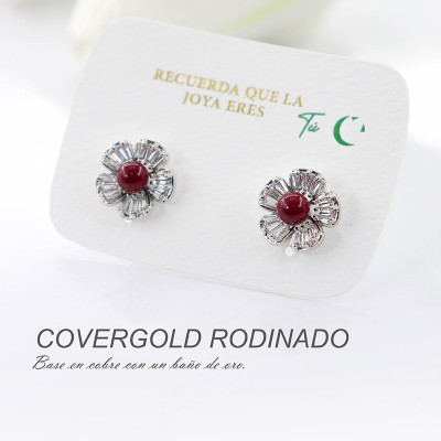Aretes Ancora de flor en covergold Rodinado