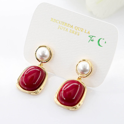 Aretes Ancora con perla en covergold Rodinado