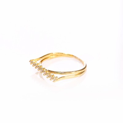 Anillo lazo cruzado en covergold