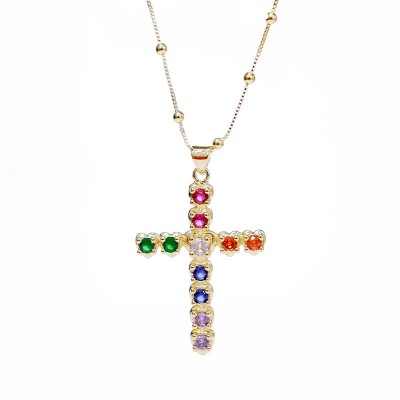 Collar de cruz en covergold