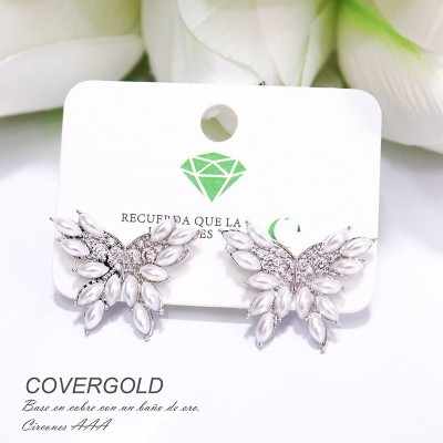 Aretes de mariposa en covergold