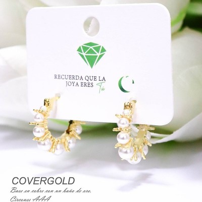 Arertes con perlas  de Shell en covergold