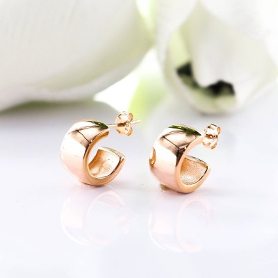 Aretes de corazon en plata ley 925 con baño en Rodio