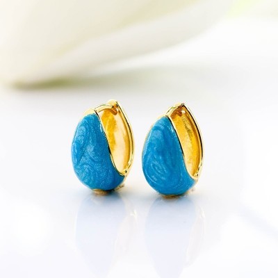 Aretes en covergold con baño en Rodio
