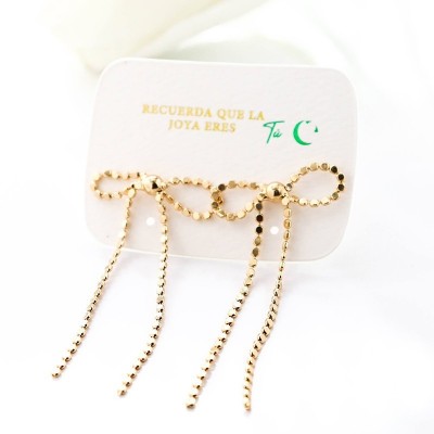 Aretes de moño en covergold con baño en Rodio