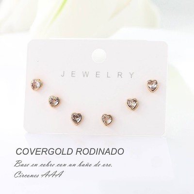 Set x 3 de aretes en covergold con baño en Rodio