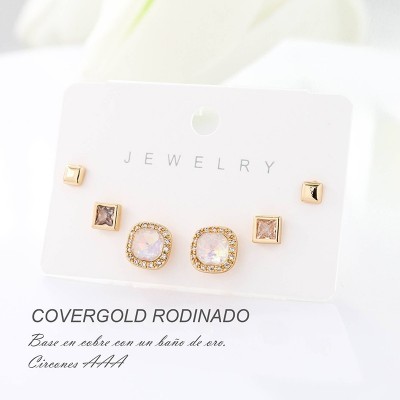Set x 3 de aretes en covergold con baño en Rodio